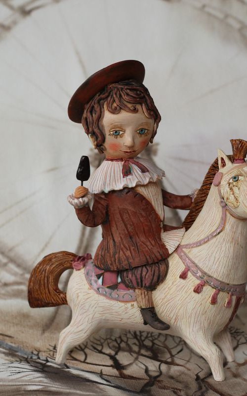 Boy riding a horse. From "Le Carousel, Hommage à l'Innocence" project by Elya Yalonetski by Elya Yalonetski