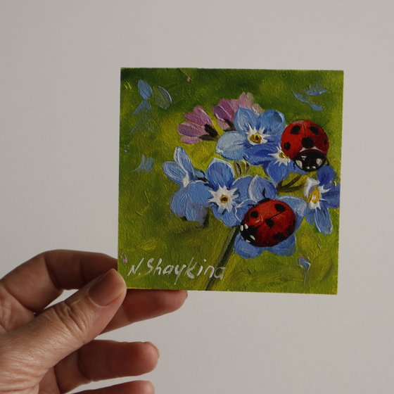 Ladybugs and Blue Flowers