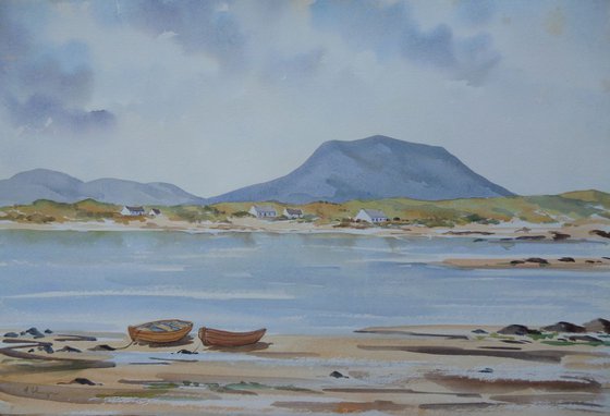 Peaceful seaside scene, with Muckish Mountain in the background.
