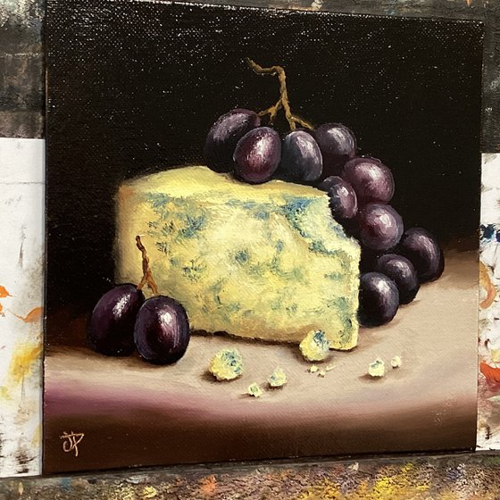 Cheese and grapes still life