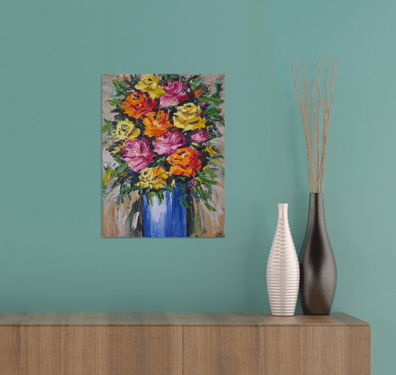 Roses in a blue vase