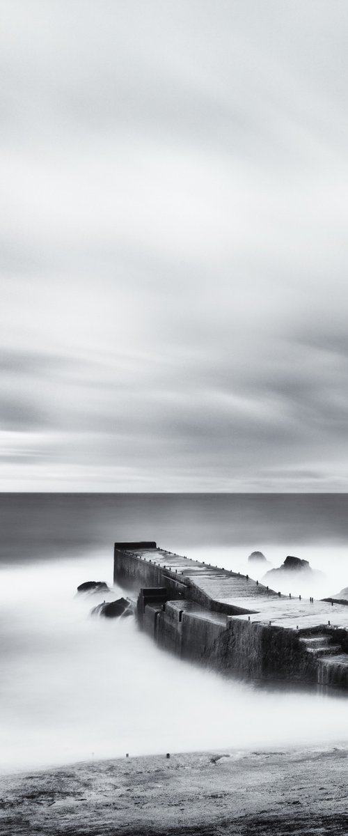 Ocean pier at dawn by Karim Carella