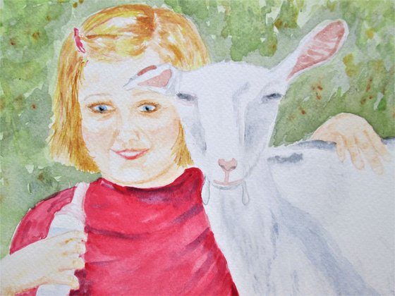 Girl feeding Goat