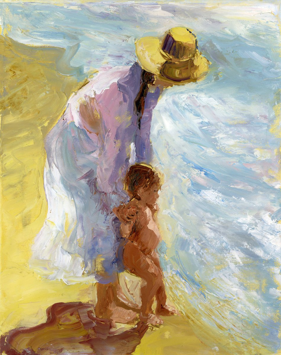 mother and child on the beach by Michael Warren