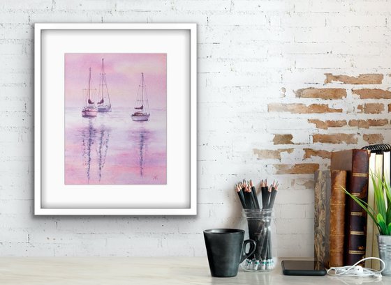 Sailboats on a pink sunset