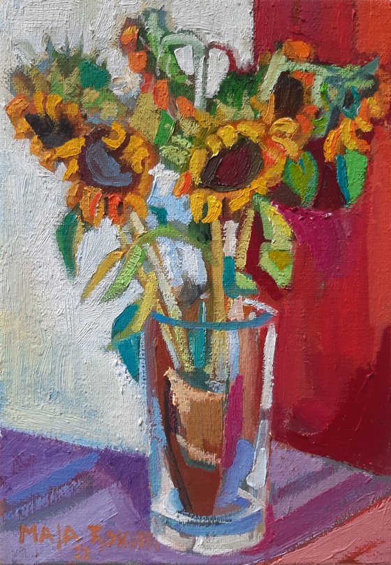 Sunflowers on a red background