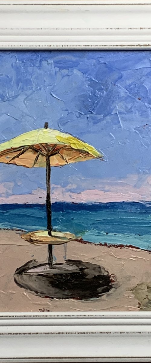 Yellow parasol on the Beach. by Vita Schagen