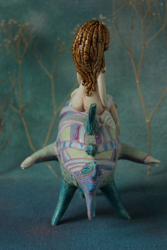 Girl riding the moon fish. Sculpture by Elya Yalonetski, 2018