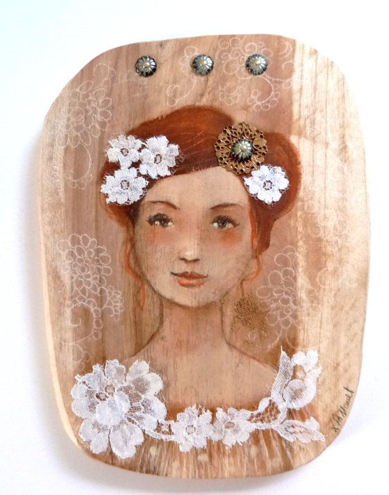 Tender Emilia on wood.