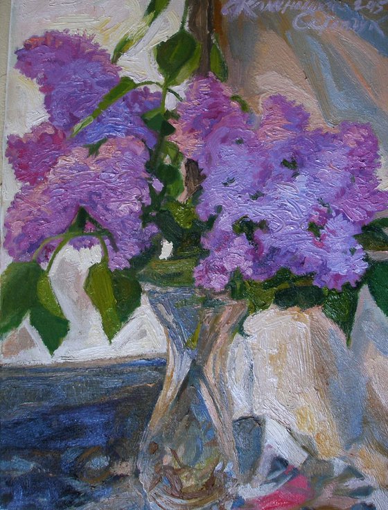 Lilacs in a crystal vase