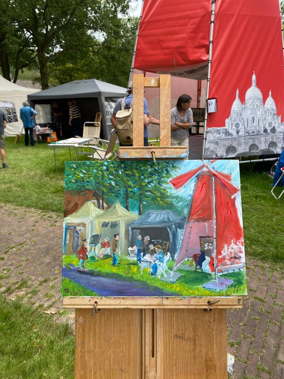 Red windmill at art festival