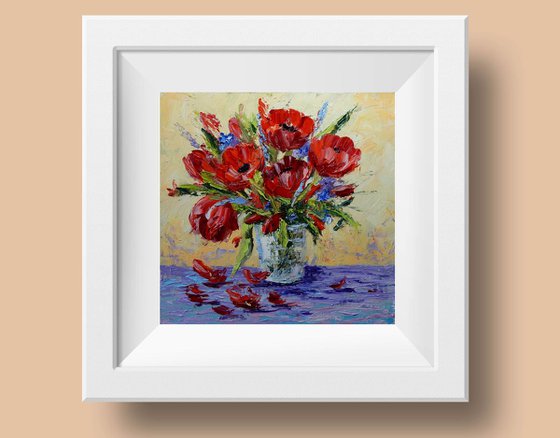 Red flowers in a vase.