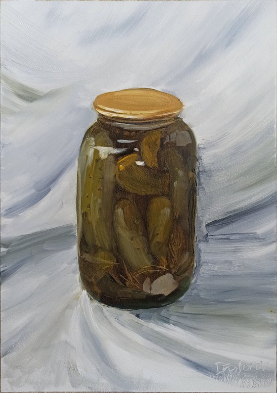 Pickled cucumbers in the glass jar
