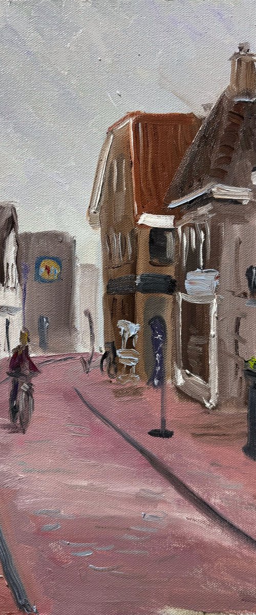 Cycling Through Beilen Center by Dmitry Fedorov