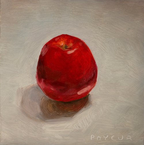 still life of red apple on a white background by Olivier Payeur