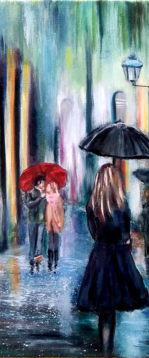 Rainy evening - Girl with an umbrella walks through the city by Liubov Samoilova