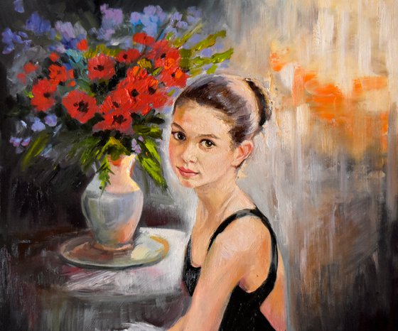 A small ballerina with red poppies