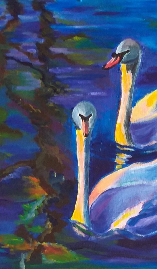 Swans in a lake by Geeta Yerra