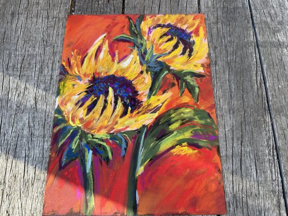 Sunflowers on a red background