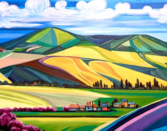 Golden fields and mountains