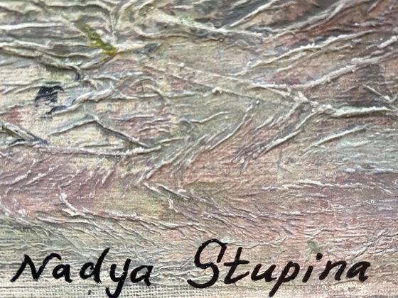 Lilies in a blue and white vase