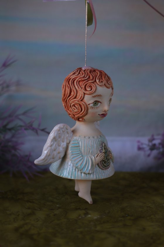 Tiny hanging sculpture. Angel