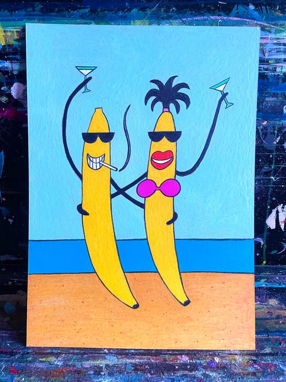 Bananas couple on the beach with Martini