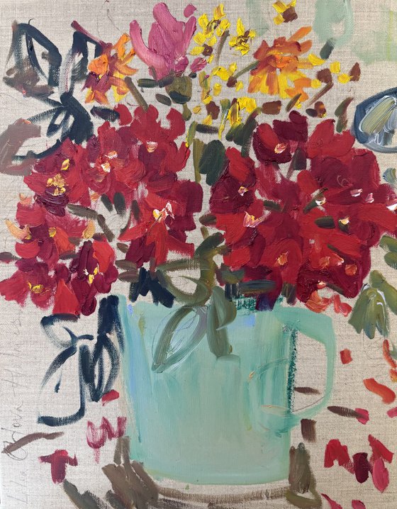 Flowers in a torquoise cup