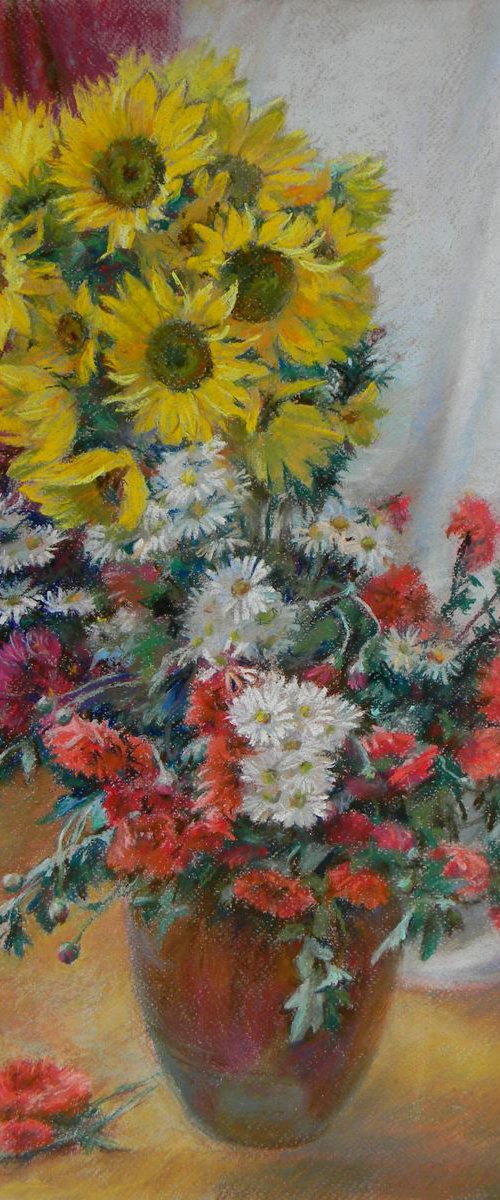 Last sunflowers by Liudmyla Chemodanova