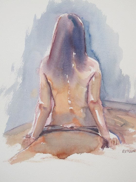 Seated female nude back view