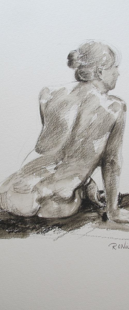 Seated female nude by Rory O’Neill