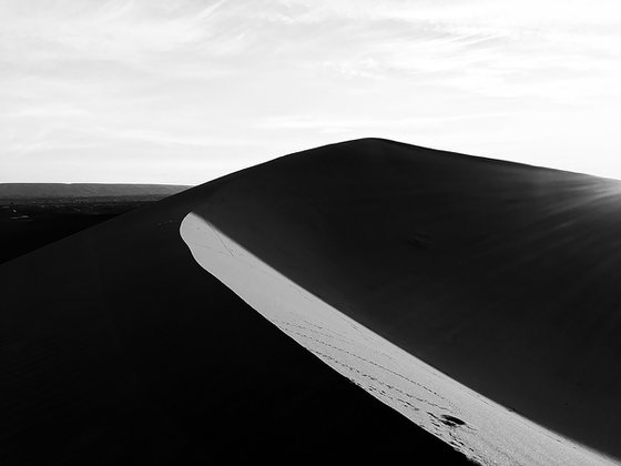 SUN ON DUNES