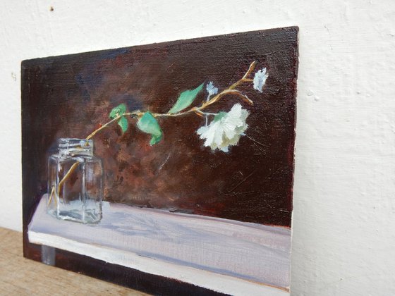 Flower in glass jar.