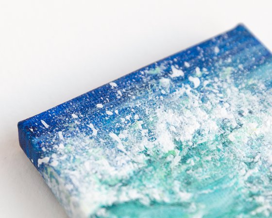 Miniature blue ocean waves