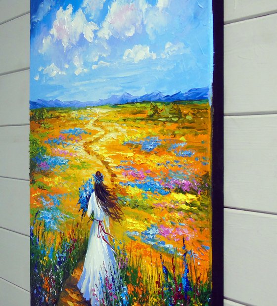 Woman Walking Through a Flower Field