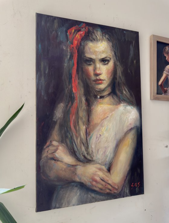 Girl with a red bow. After.