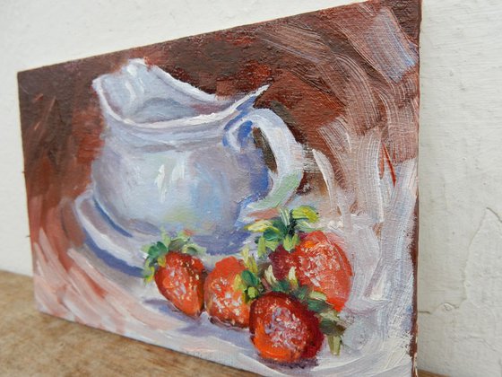 Cup with strawberries.