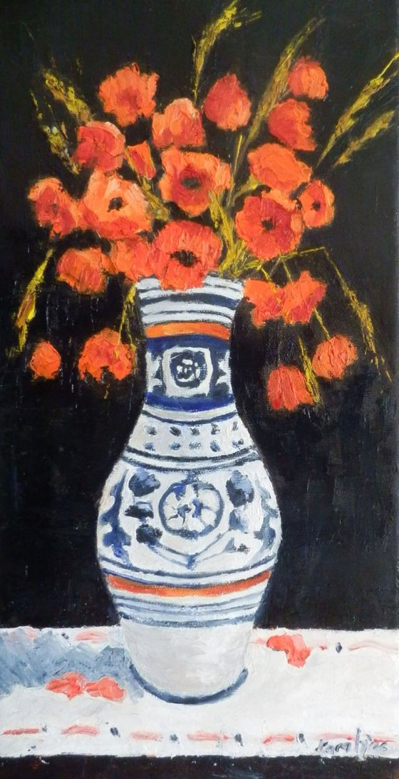 Poppy flowers in a traditional pot