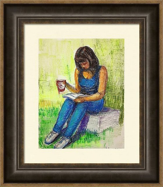 Young girl reading a book