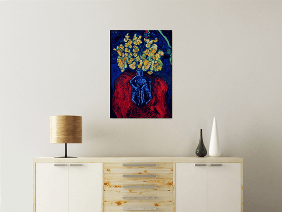 Daffodils in a blue glass