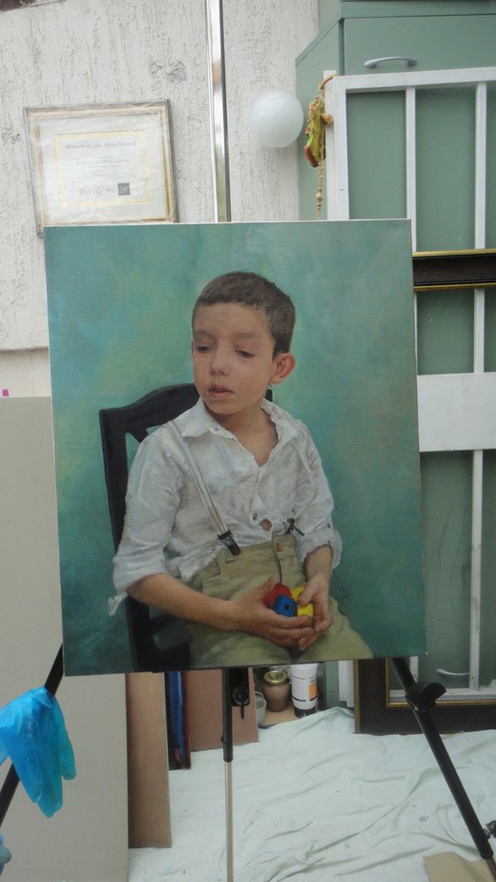 Boy with wooden cubes
