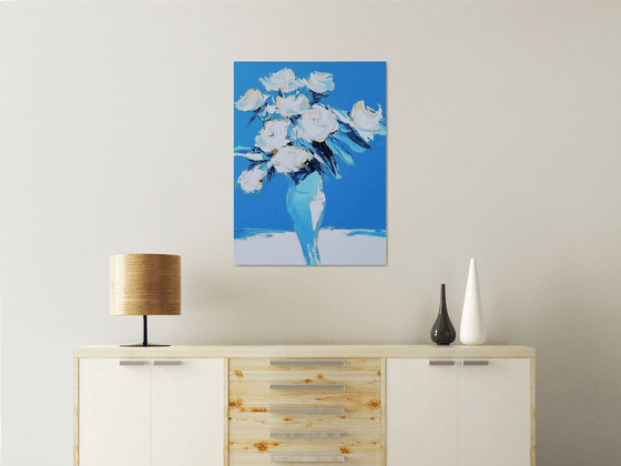 White Roses In A Blue Vase