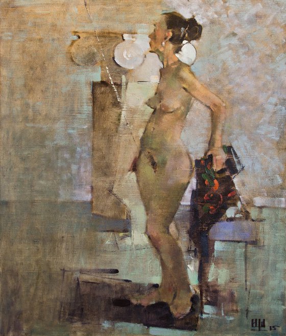 Nude woman model in artstudio.