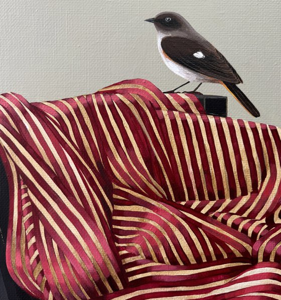 Silk, chair and bird