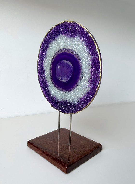 Amethyst framed in a glass circle