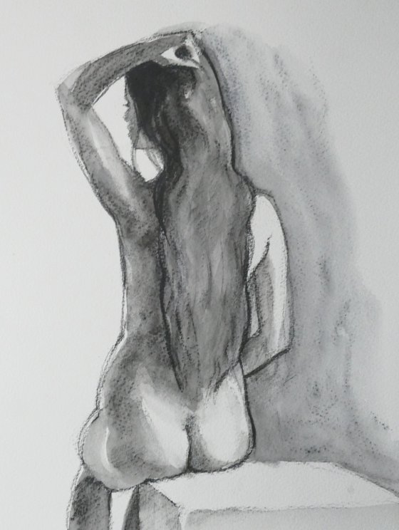 Seated female nude