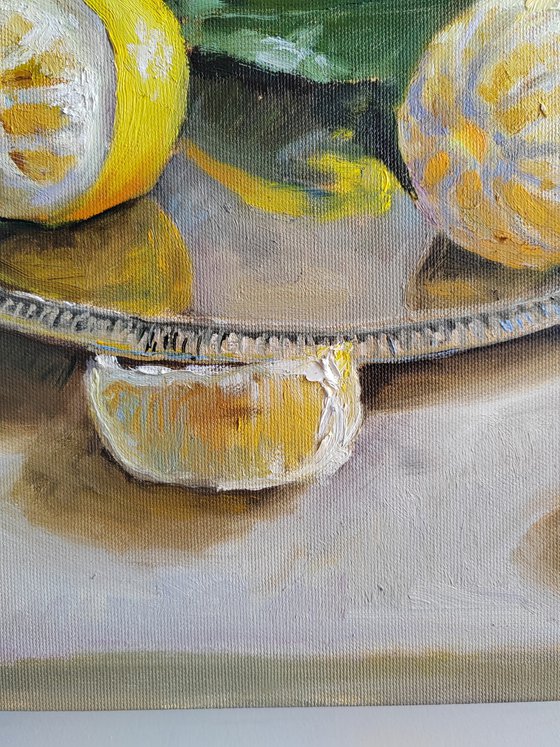 Lemon fruit slices on metal tray still life