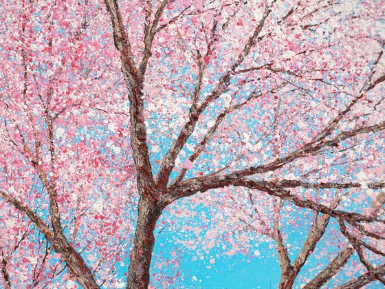 CHERRY BLOSSOM DANCES IN THE BLUE SKY
