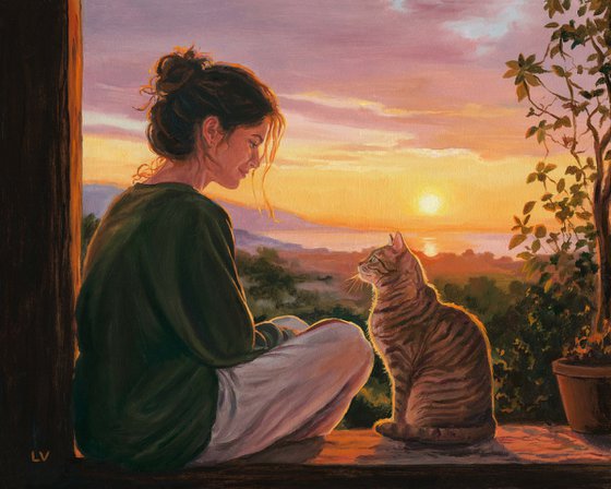Girl watching the sunset with her tabby cat