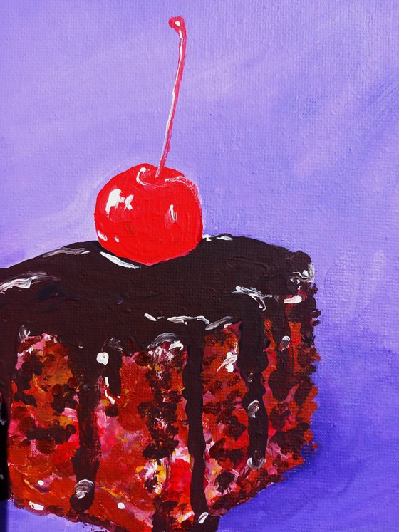 "Chocolate cake with cherry on top"
